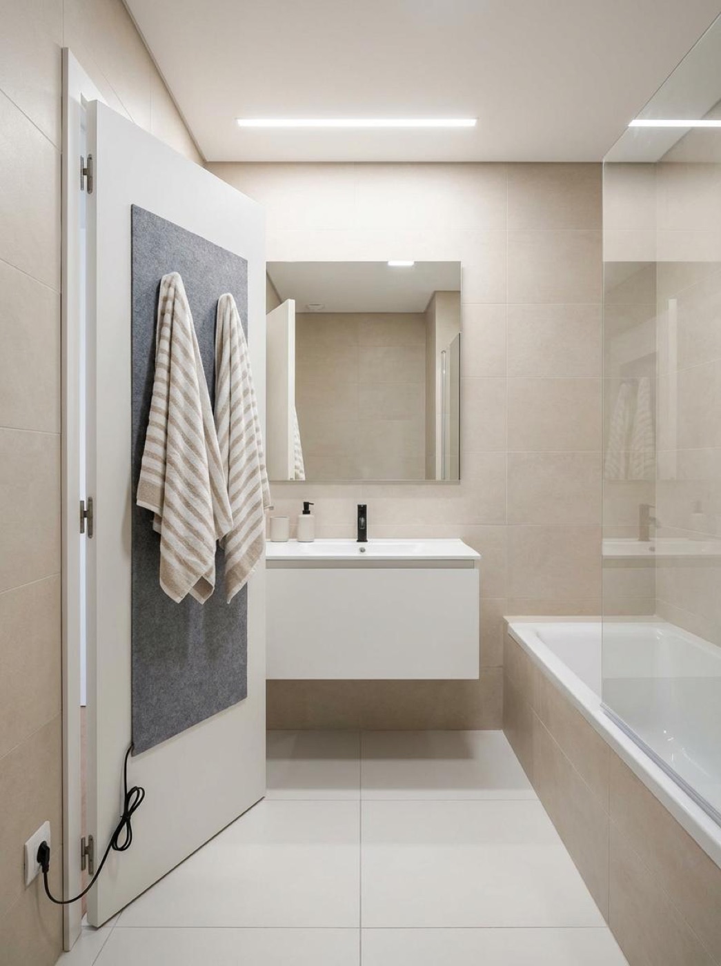 QUENTEX towel heater in a bathroom